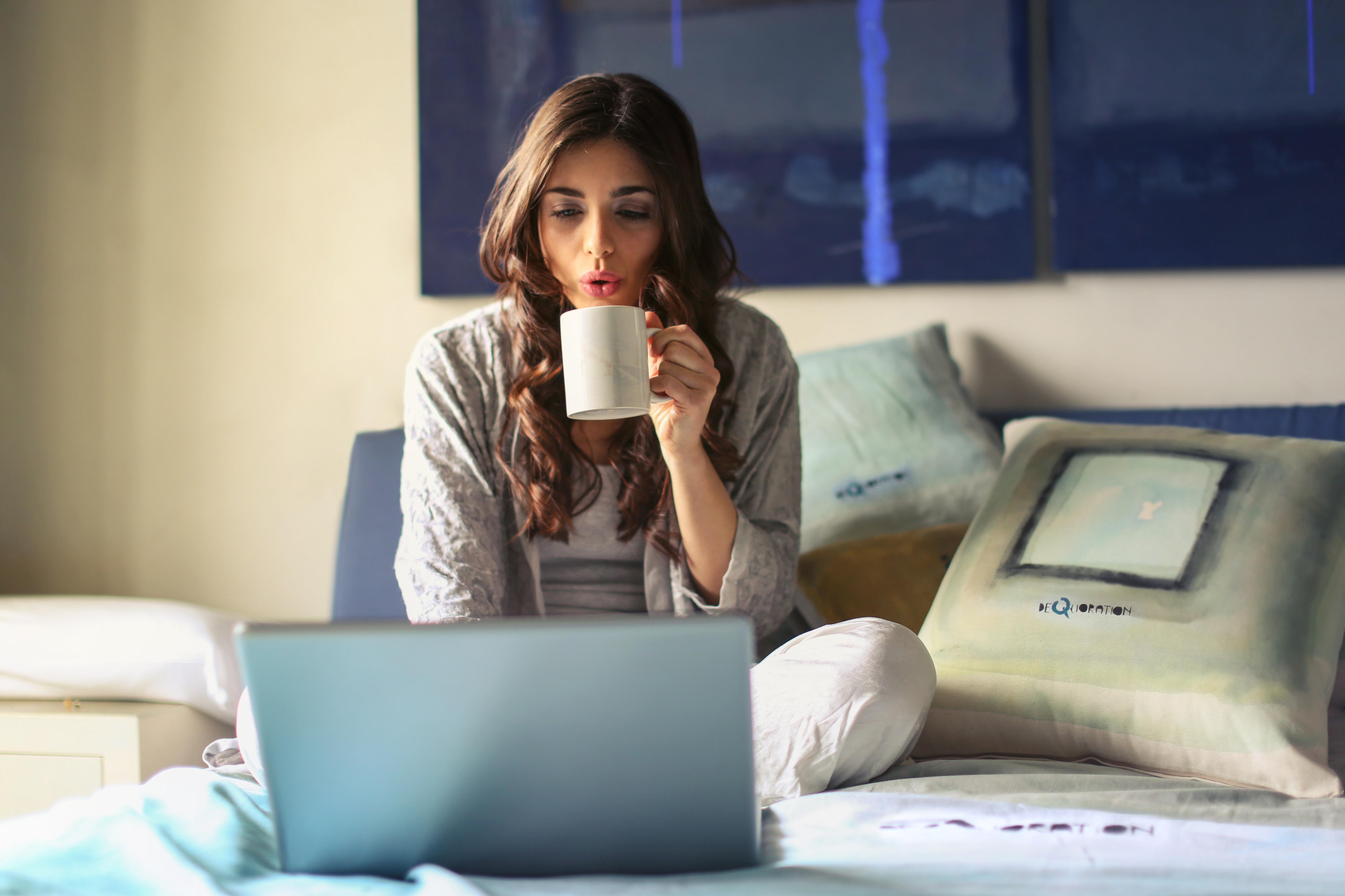a woman drinking coffee